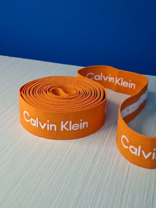 Elastica Estampada 35mm Naranja Calvin Klein (10 Metros)
